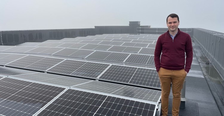 Cllr Lewis Cocking with solar panels at Theobalds Enterprise Centre 